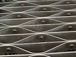 Riveted Grating