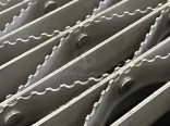 Riveted Grating