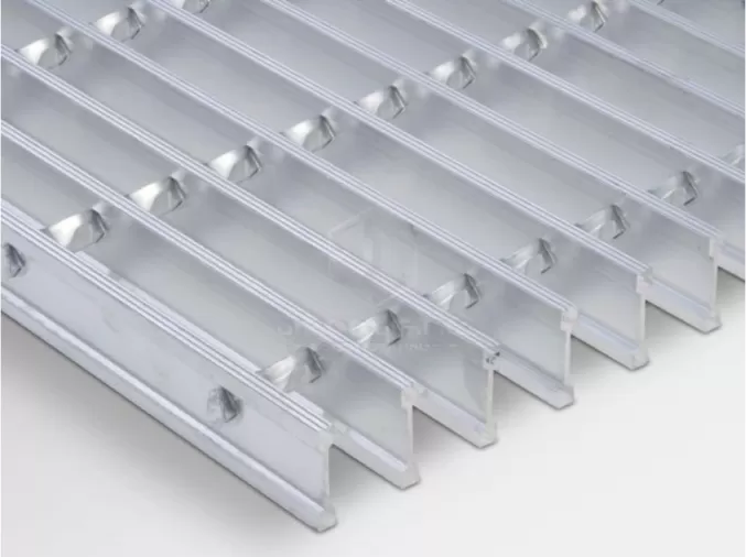 Swage Locked Grating